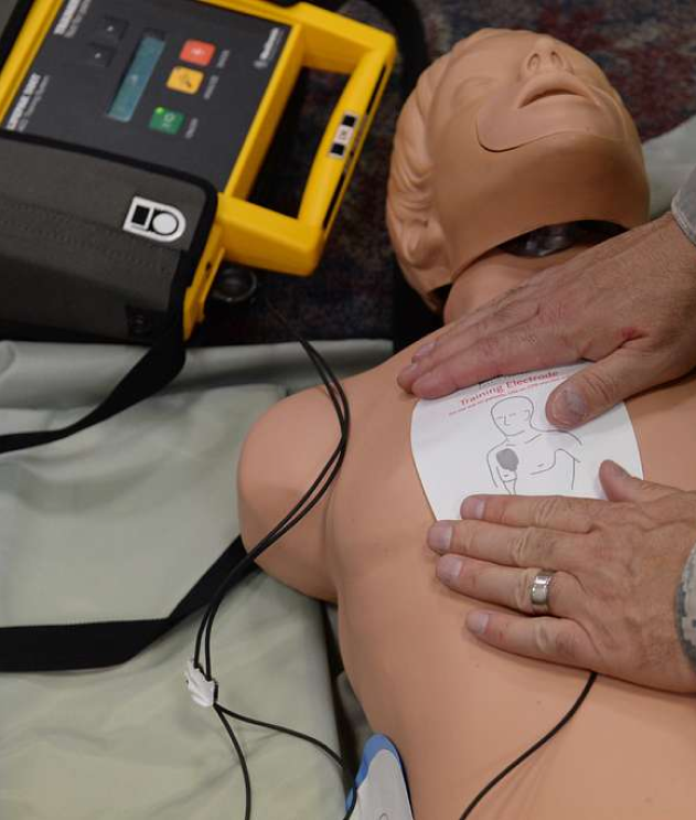 Close-up of a portable defibrillator, designed for quick response in cardiac emergencies.}